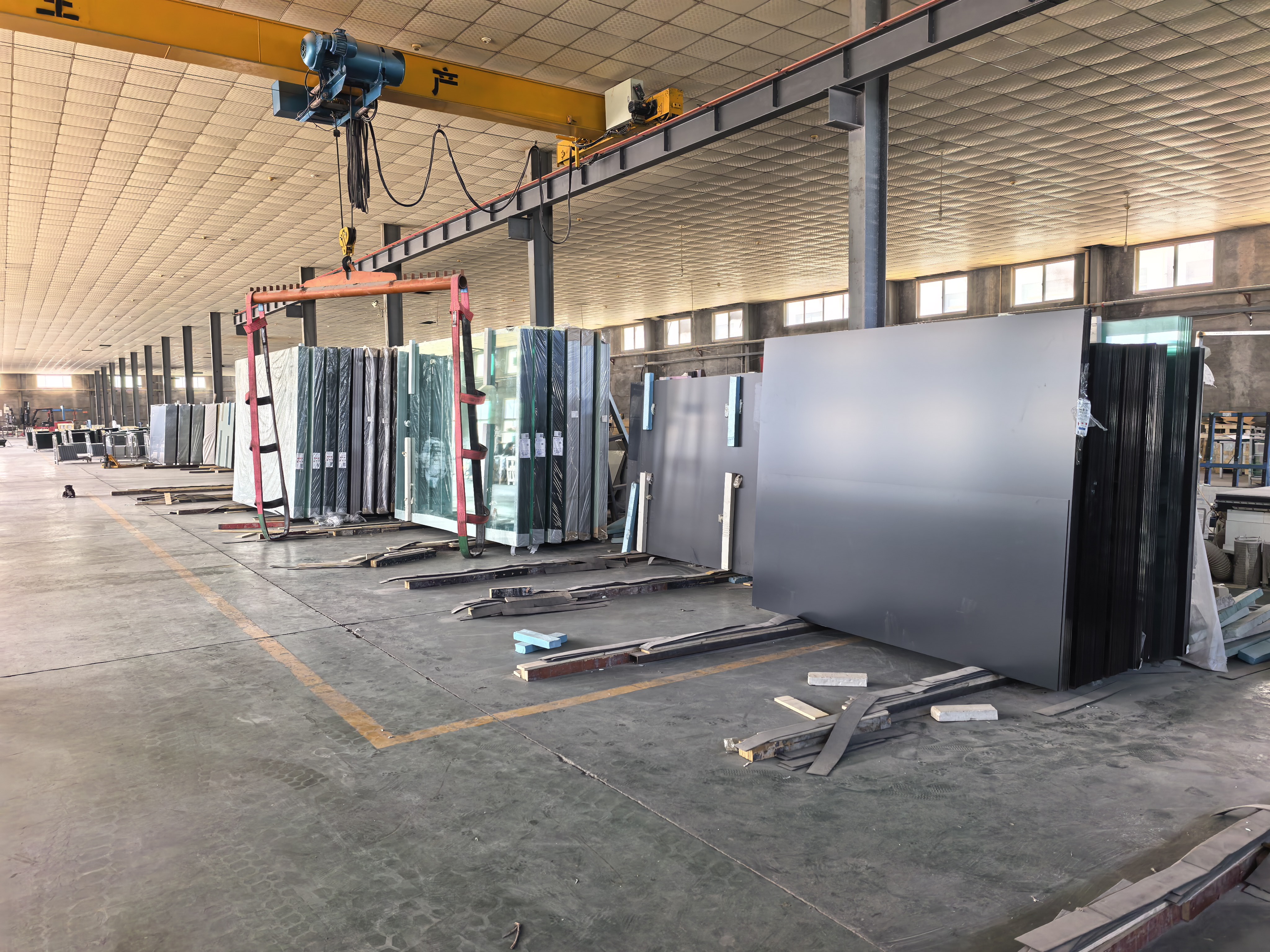 Mirror and glass panels prepared at a production partner facility